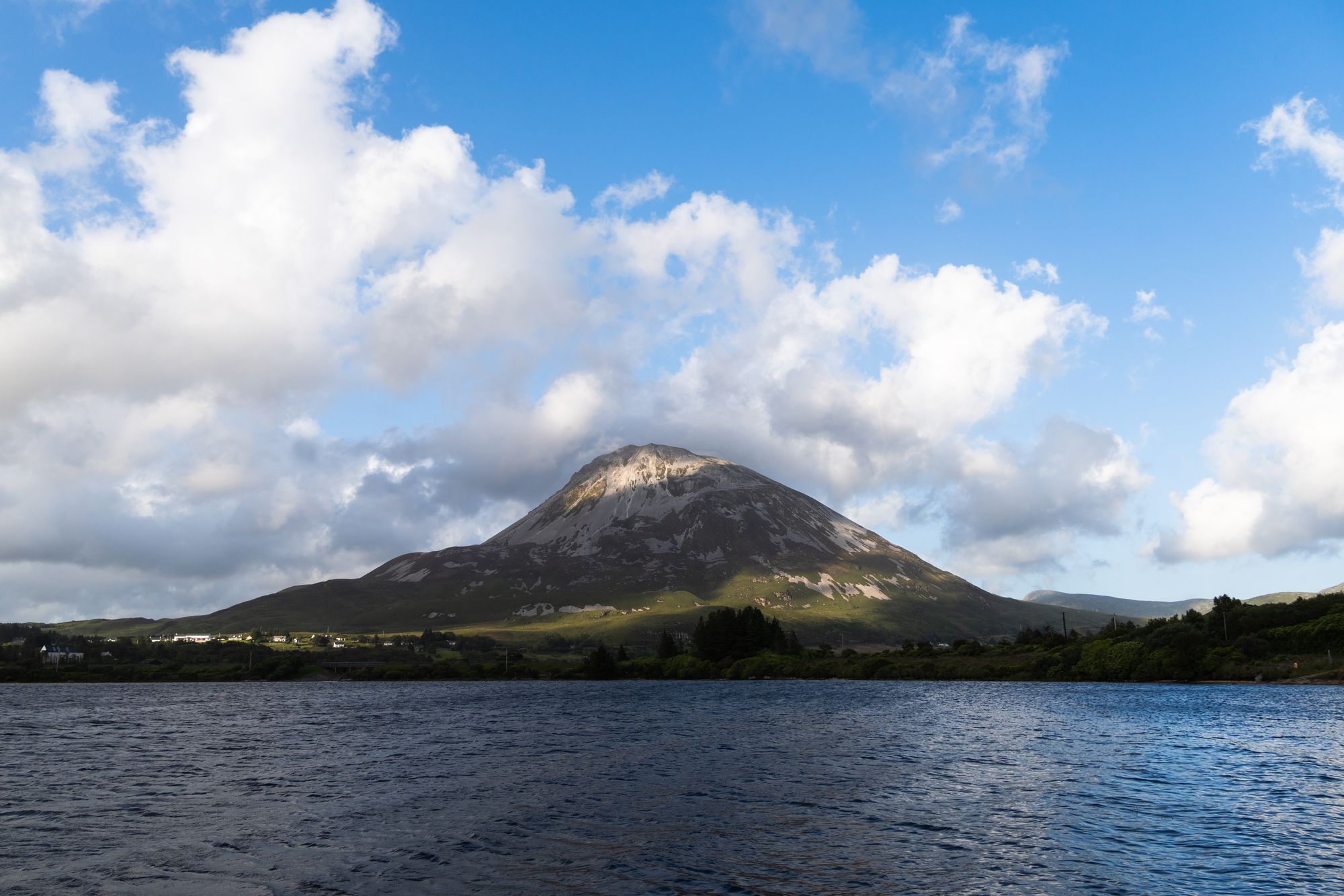 The quartzite peak of Errigal above the small lough at its foot, County Donegal